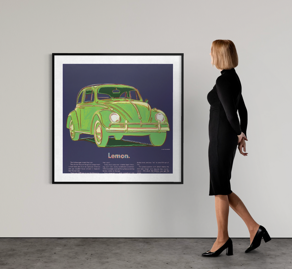 alt="Andy Warhol Volkswagen 1985 screenprint from Ads Portfolio displayed framed on gallery wall interior view"
