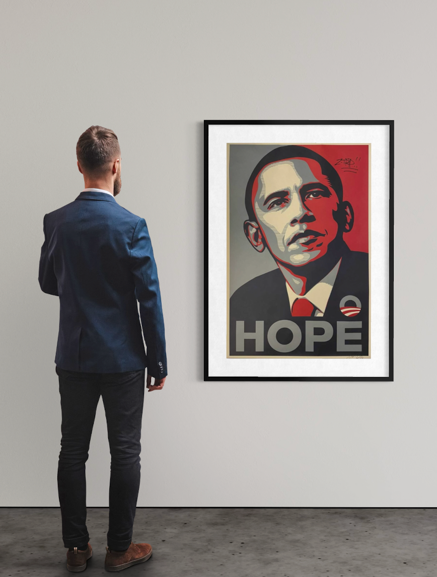 alt="Shepard Fairey Hope 2008 signed Obama poster displayed framed on wall contemporary interior view"

