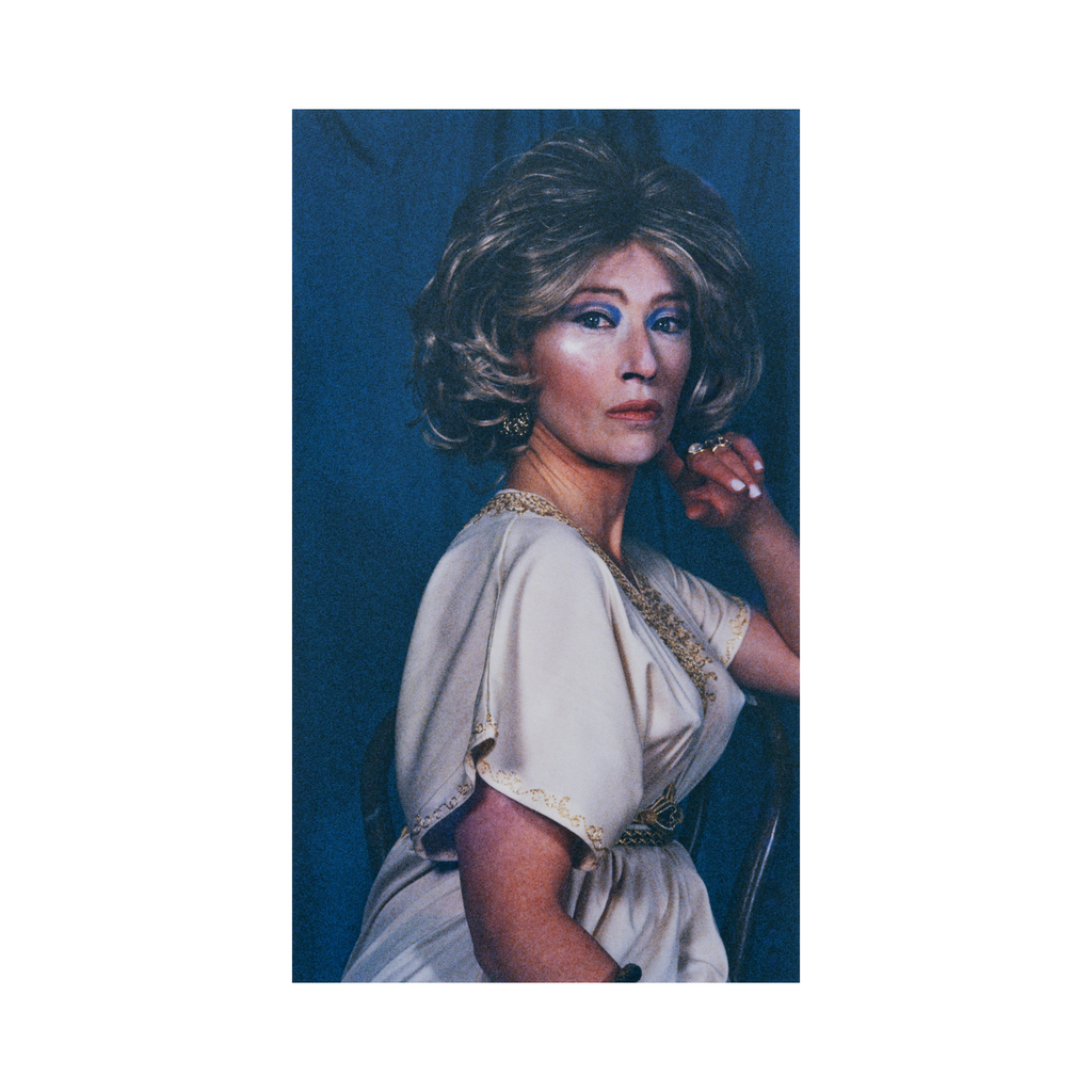 alt="Cindy Sherman Untitled Portrait III Head Shots series 2000-2002 color photograph depicting staged female headshot with styled hair and dramatic studio lighting"
