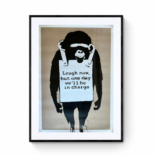 BANKSY - Laugh now - Manifesto ufficiale della mostra "The World of Banksy" a Parigi